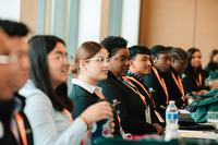 Students at MANRRS conference listen intently during a session.