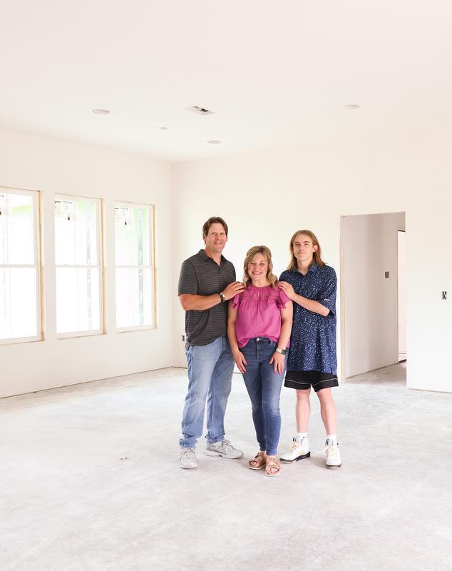 Same spot. Different season. One year transformed construction plans into a family home filled with memories.
