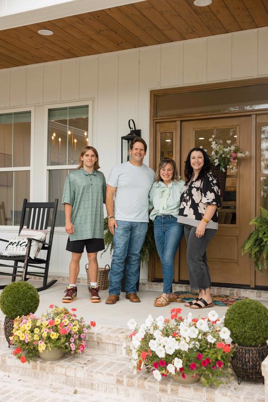Farm Credit loan officer Shelby Bradley with the Mourot family