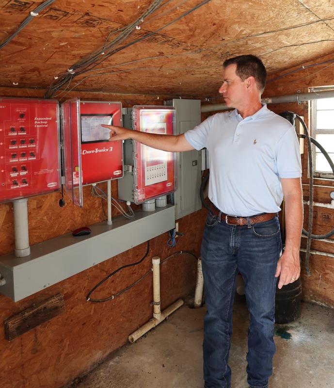 Cody Jones inside poultry houses