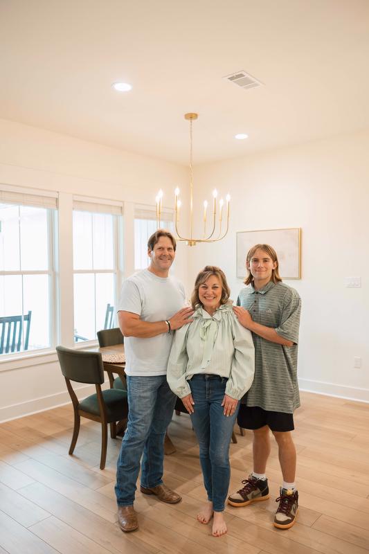 Same spot. Different season. One year transformed construction plans into a family home filled with memories.