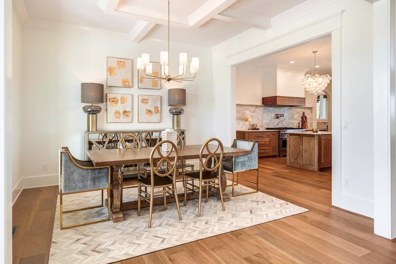 Modern dining room with gold accents