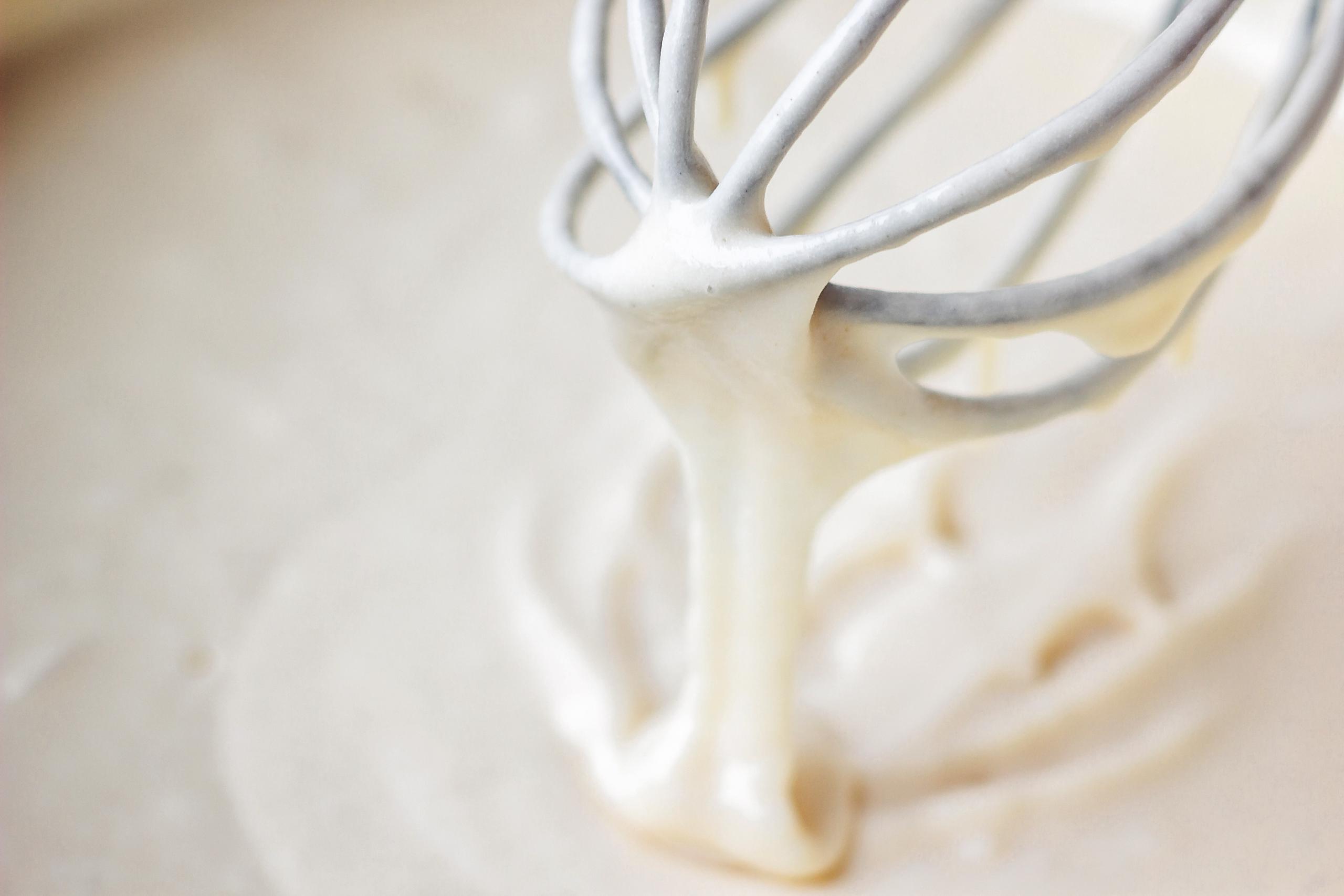 Cake batter dripping from beater